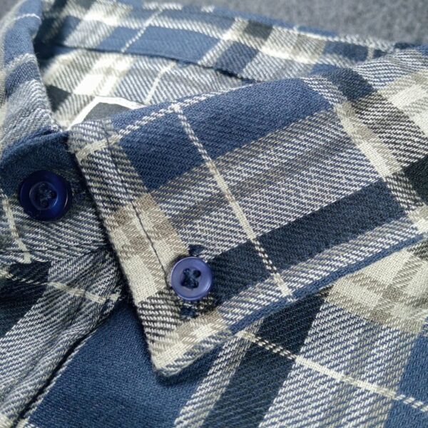 Close-Up of Men's Navy Blue Plaid Shirt Collar - Button-Down Design with Detailed Stitching